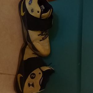 Black and gold nike